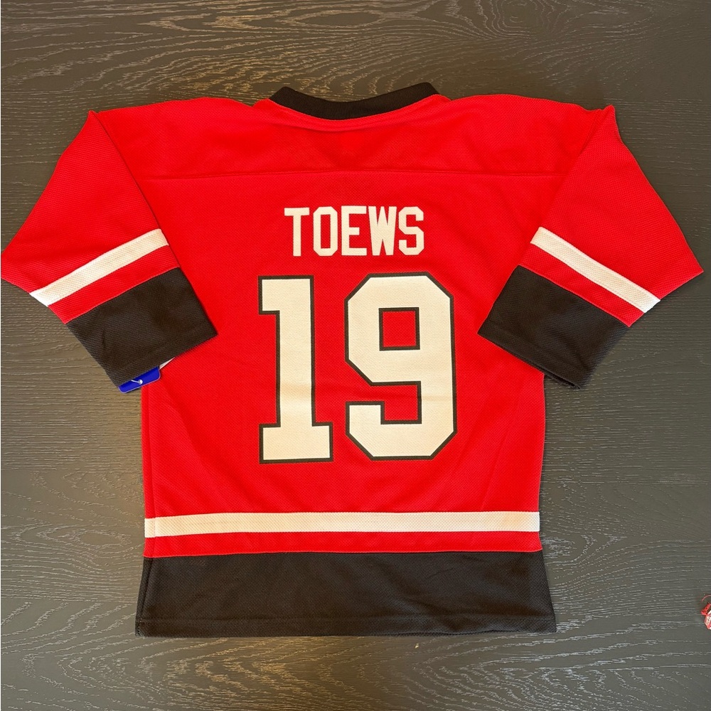 NWT Chicago Blackhawks Jonathan Toews Jersey NHL NHLPA Size Youth Boy's L 12/14